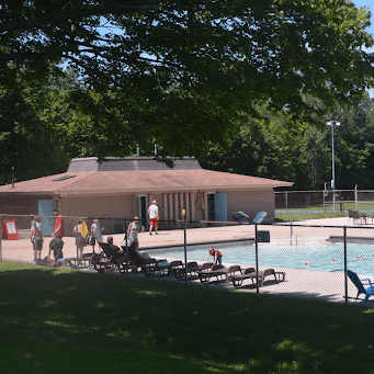 image of students studying outdoors on campus